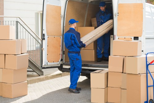 Professional commercial movers handling office equipment in Croydon