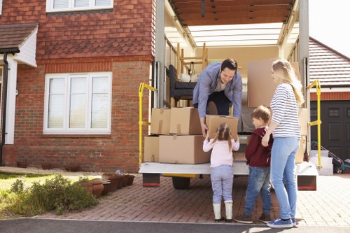 Professional movers handling household items