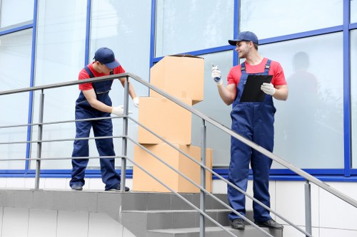 Professional packing team handling household items in Croydon