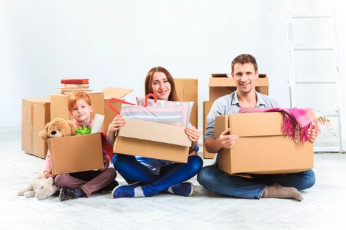Team of removalists handling furniture during a move